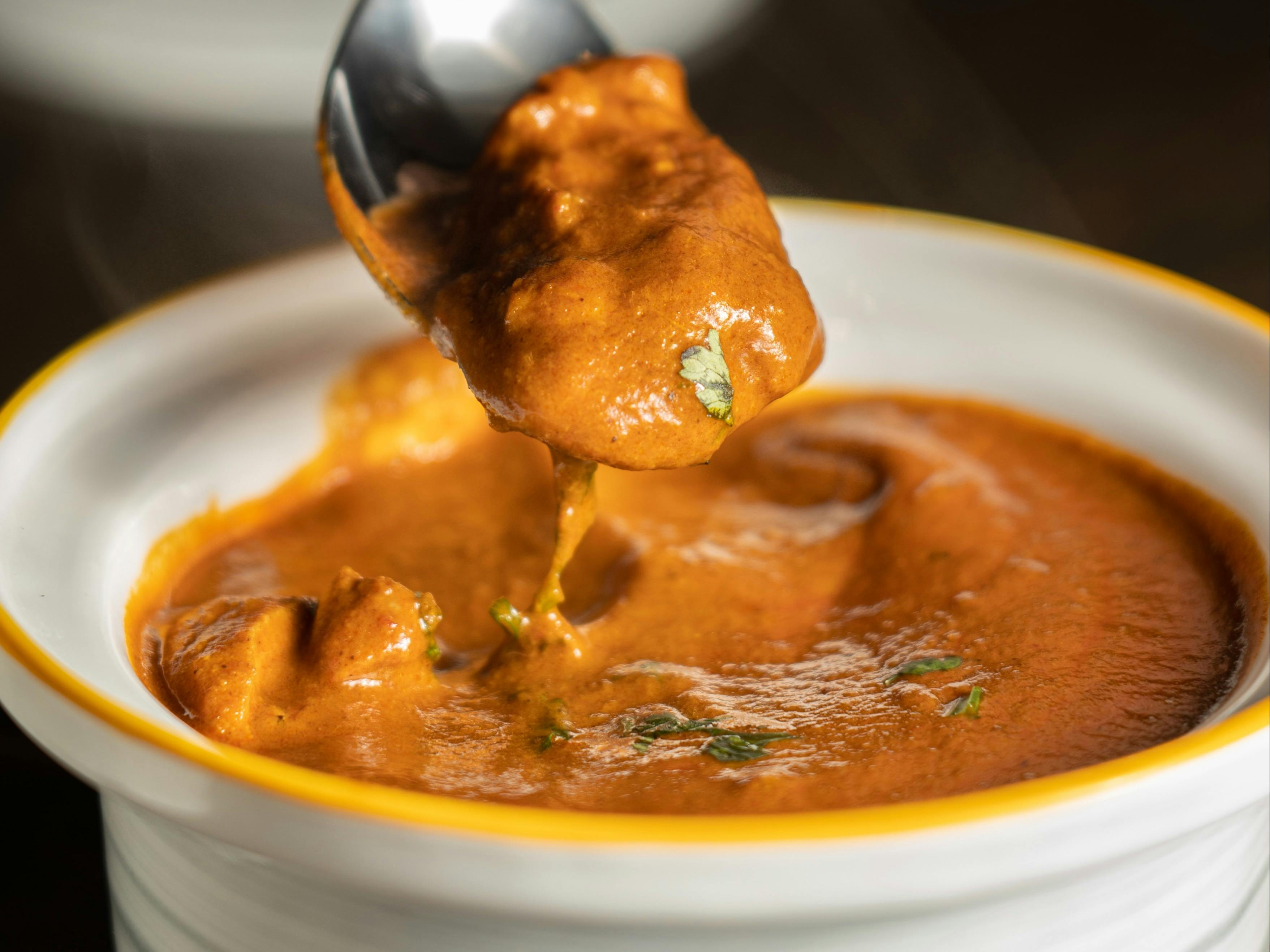 Serving of curry (Pushpak Dsilva/Unsplash)