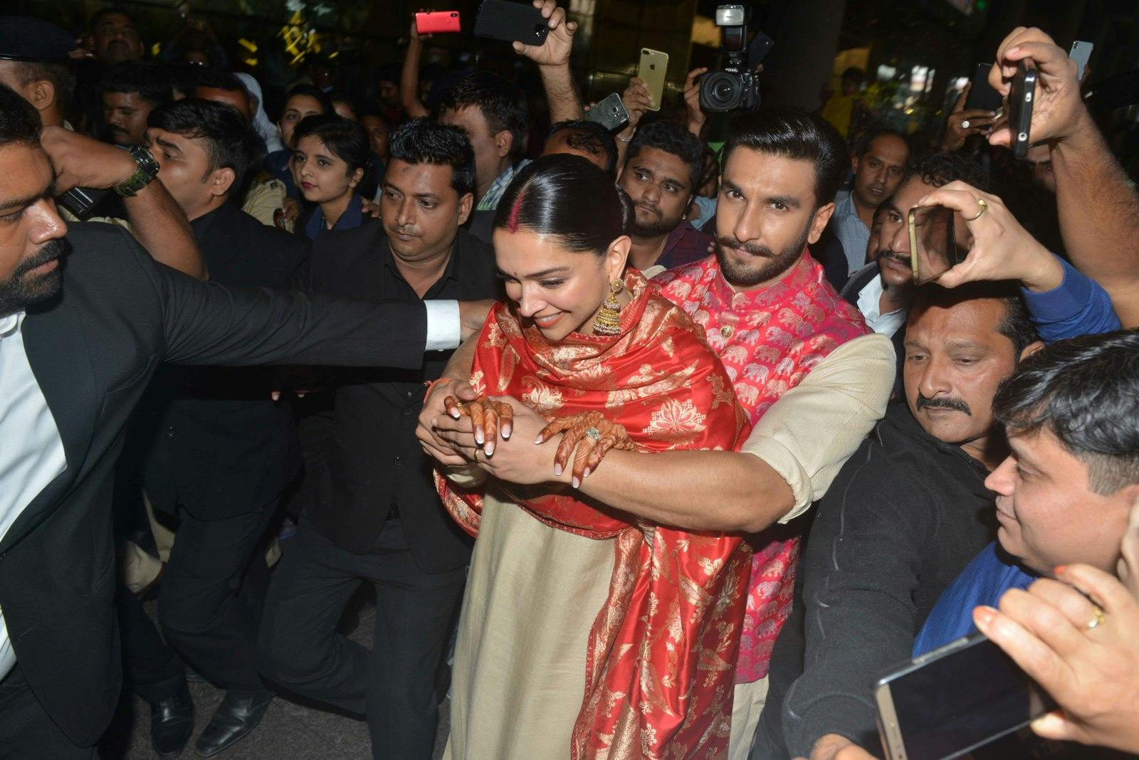 Ranveer Singh and Deepika Padukone arrive at Mumbai airport after their wedding, in Lake Como, Italy. (Milind Shelte/India Today Group/Getty Images)