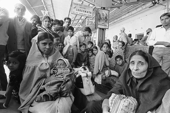 Eleven days after the gas leak, a Bhopal train station is permanently full as entire families leave to seek refuge elsewhere. (Alain Nogues/Sygma/Sygma via Getty Images)