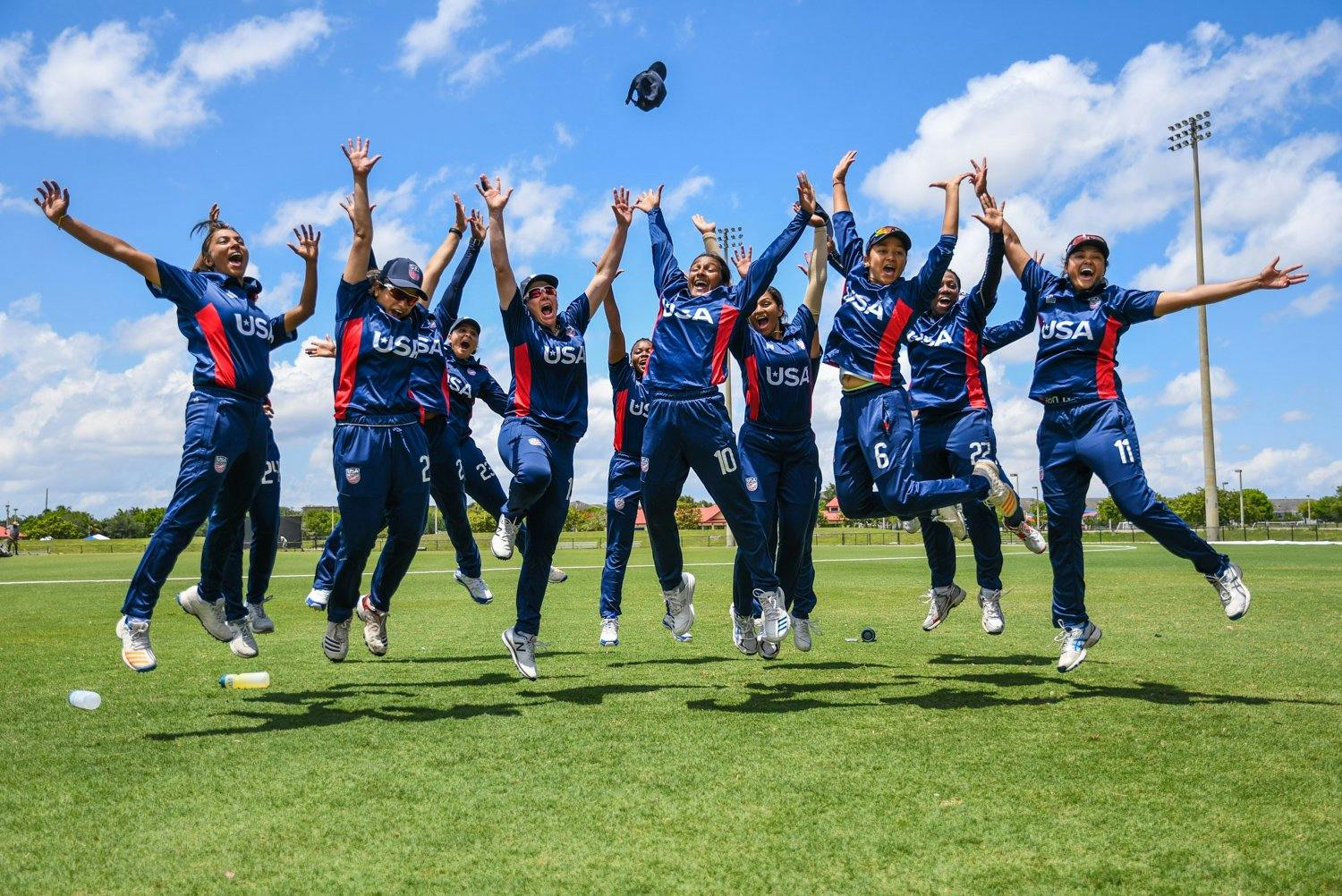 The U.S. women's cricket team celebrates after a 3-0 victory against Canada in a T20 series in May that helped seal a spot in the ICC T20 Global Qualifiers, to be held in Scotland next month. (USA Cricket)
