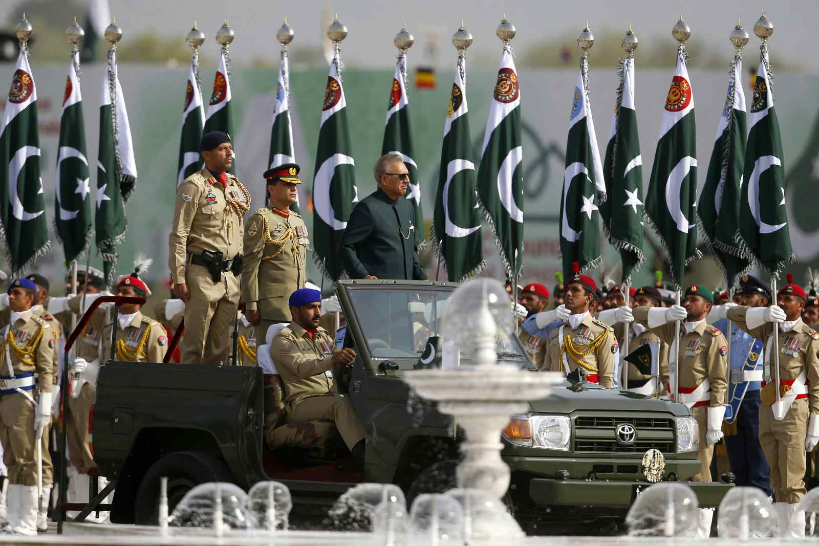 Pakistani President Arif Alvi reviews a military parade to mark Pakistan National Day in Islamabad, Pakistan, Wednesday, March 23, 2022 (Anjum Naveed / AP)