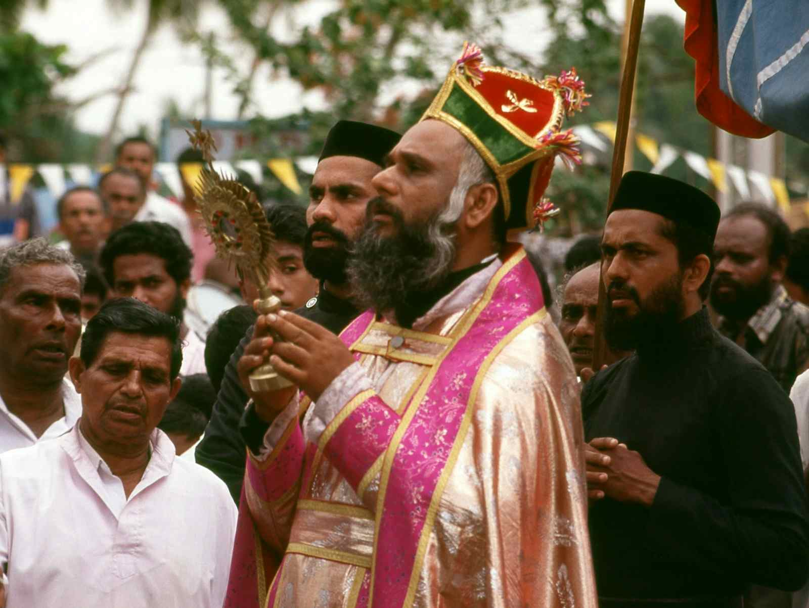 A Syrian Orthodox Christian priest celebrates Saint George's Day in Kottayam, Kerala. The Malankara Orthodox Syrian Church is a church based in Kerala, India. According to tradition, the church originated in the missions of Thomas the Apostle in the 1st century CE. (Rainer Krack/Pictures From History/Universal Images Group via Getty Images)