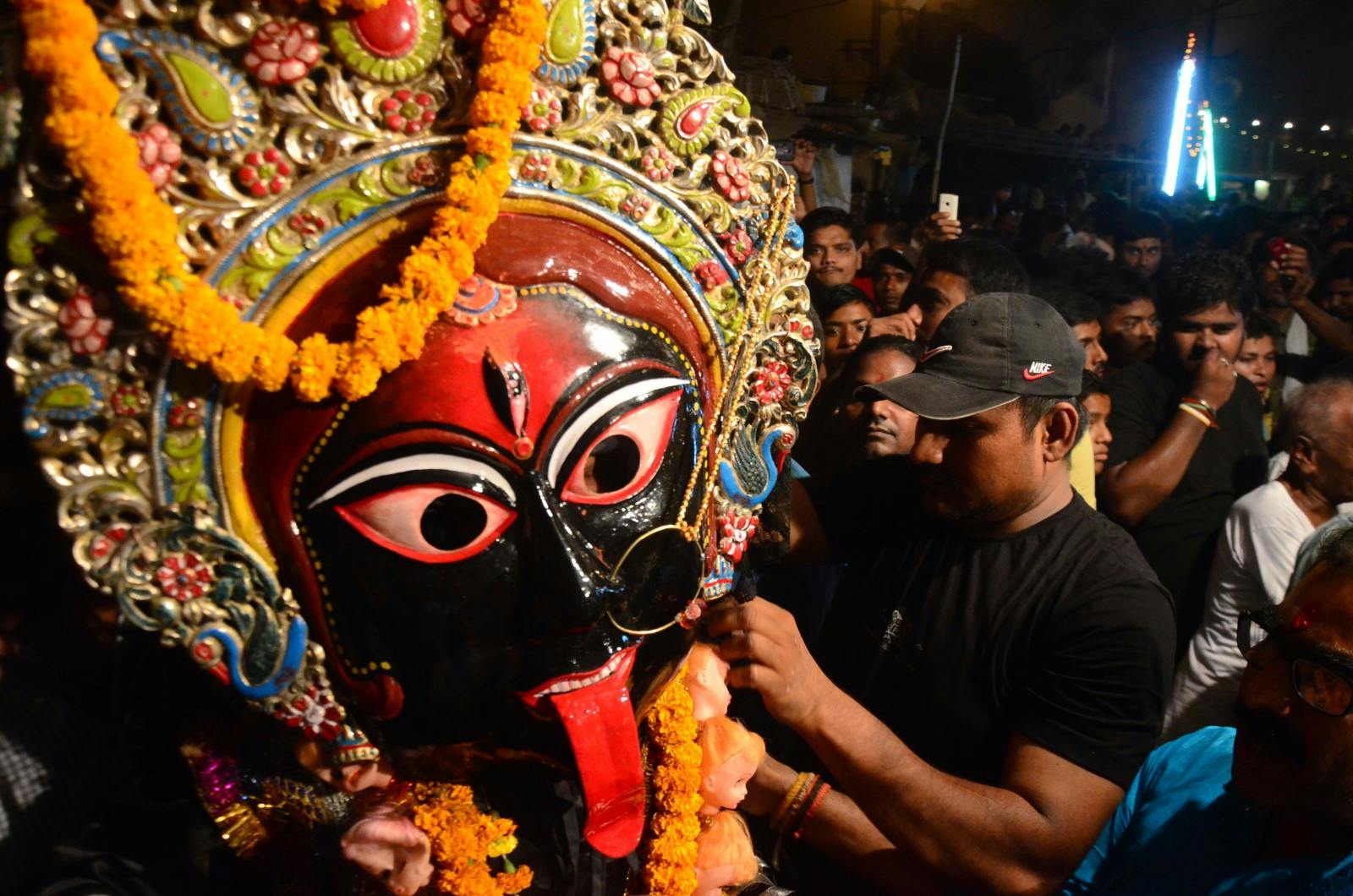 An Indian artist dressed as Hindu Goddess Kali performs the traditional ‘Kali Swang’ during Dussehra in Allahabad, India (Prabhat Kumar Verma/Pacific Press/LightRocket via Getty Images)
