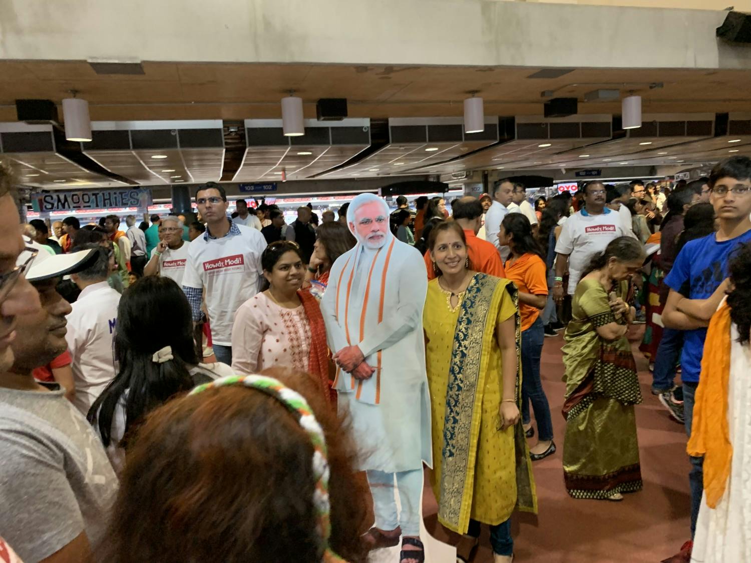 Howdy Modi! attendees pose with a Modi cutout. (Snigdha Sur)