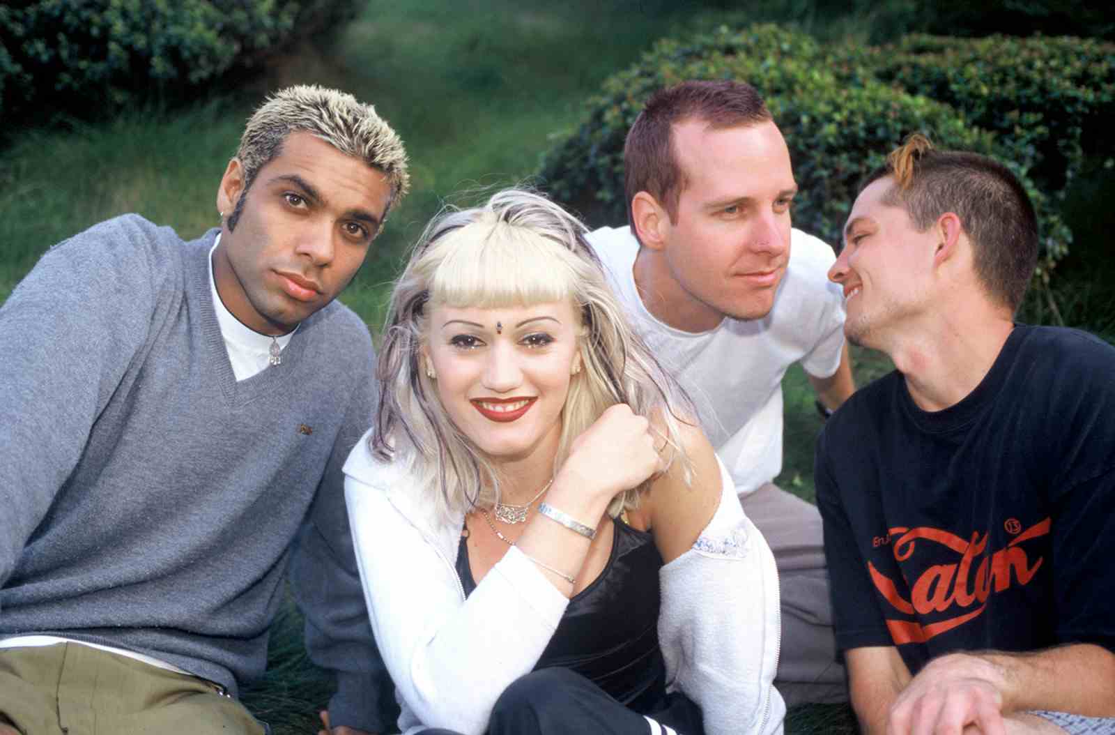 No Doubt band members bassist Tony Kanal, singer Gwen Stefani, Tom Dumont, and Adrian Young backstage Live 105's BFD 1996 at Shoreline Amphitheatre on June 14, 1996 in Mountain View, California (Tim Mosenfelder/Getty Images)