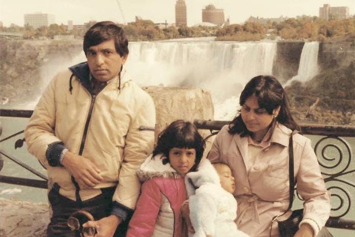 Priya Agrawal at Niagara Falls, 1981: "My parents, who are in their early 30s in this photo, migrated to the USA in 1969. Girdhar (not pictured) was visiting the USA from Aligarh, India. As it was his first time in the States, my parents drove us to Niagara Falls, a destination even now insisted upon by our visitors from India. I think my parents have made that same drive dozens of time." (SAADA)